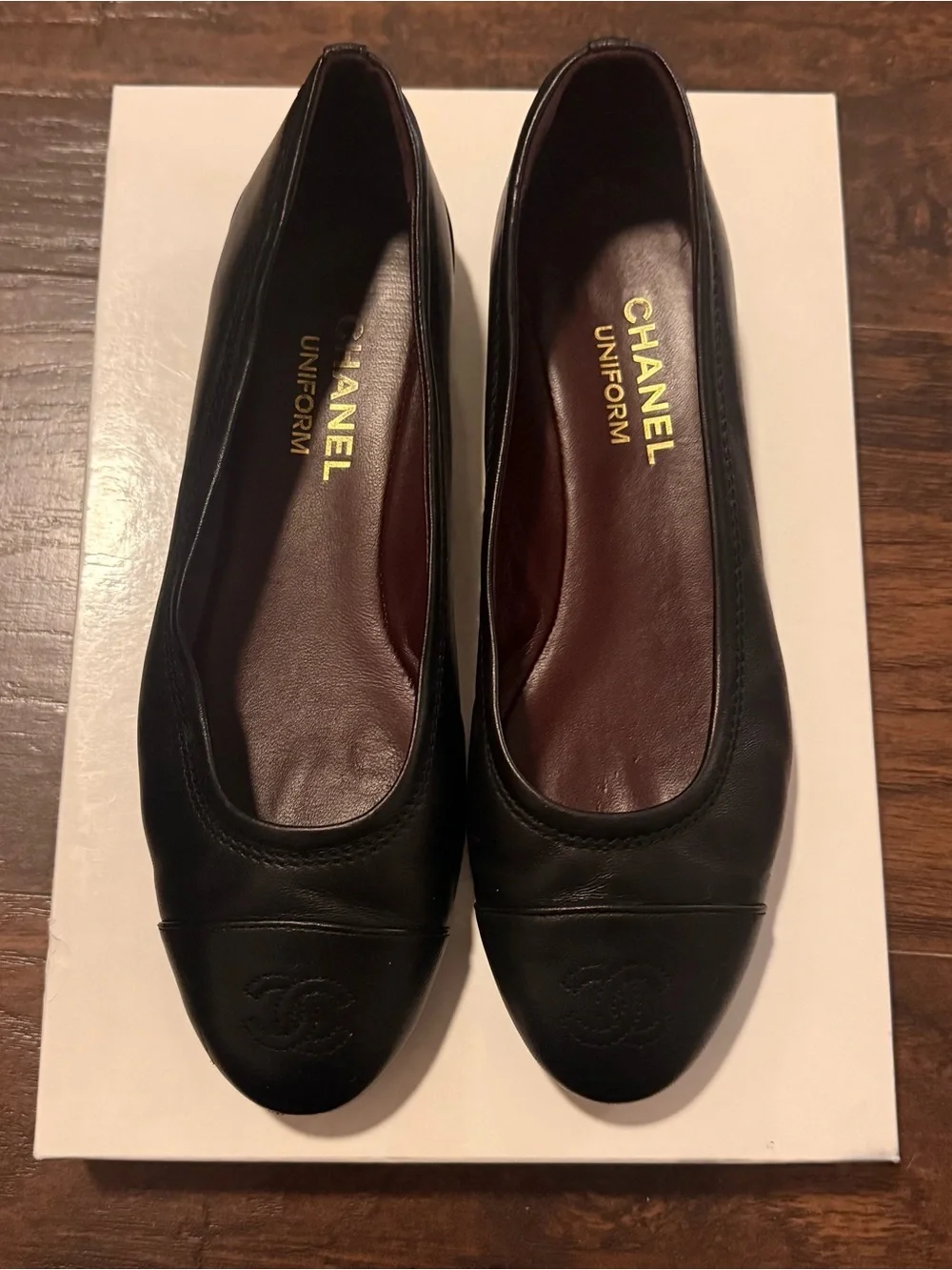 CHANEL Black Leather Ballet Flats with Embossed CC Toe - uniform